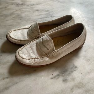 White leather Bass Weejuns penny loafers